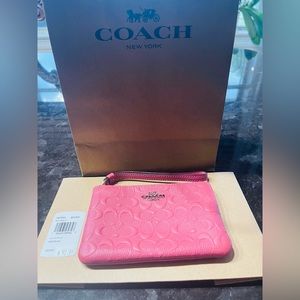 Small Wristlet pink brand new still have tags